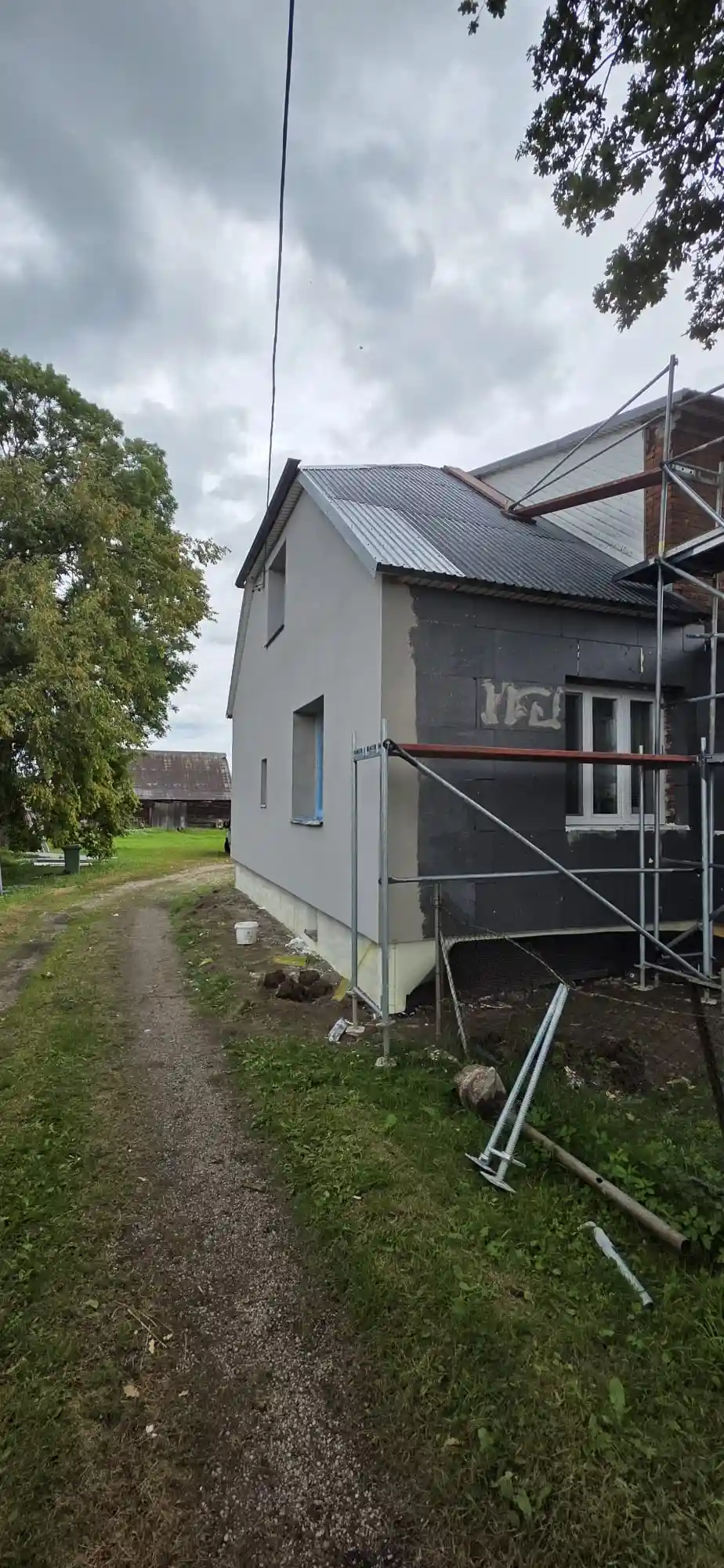 Ocieplenie elewacji styropianem, realizacja DoMpro
